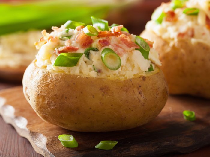 Stuffed potatoes with bacon and cheddar