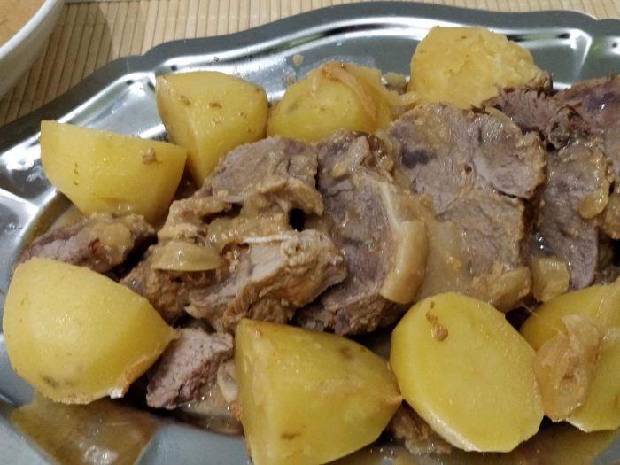 Pork roast with milk and potatoes