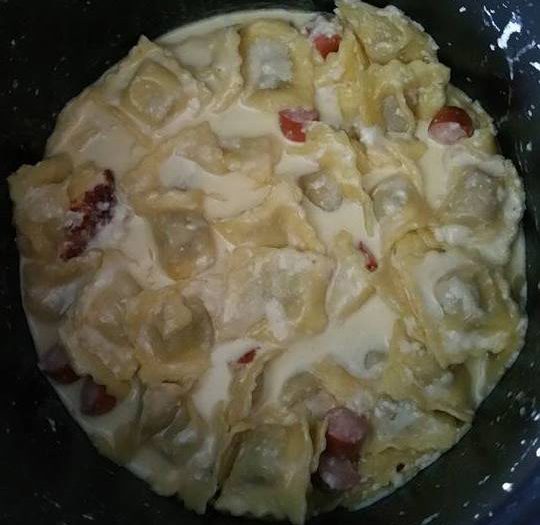 Ravioli with Strasbourg sausages and babybel cheese